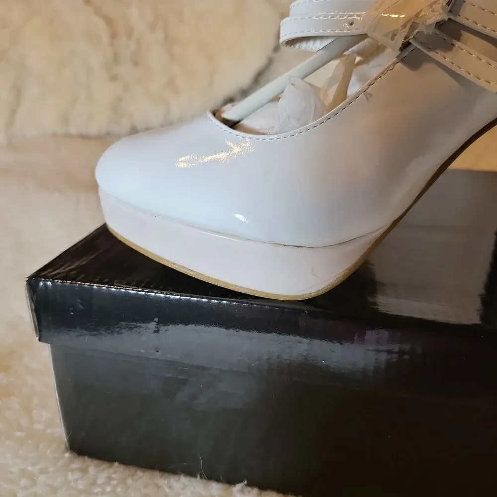 White patten Mary Jane's, with light pink platforms size 5/6